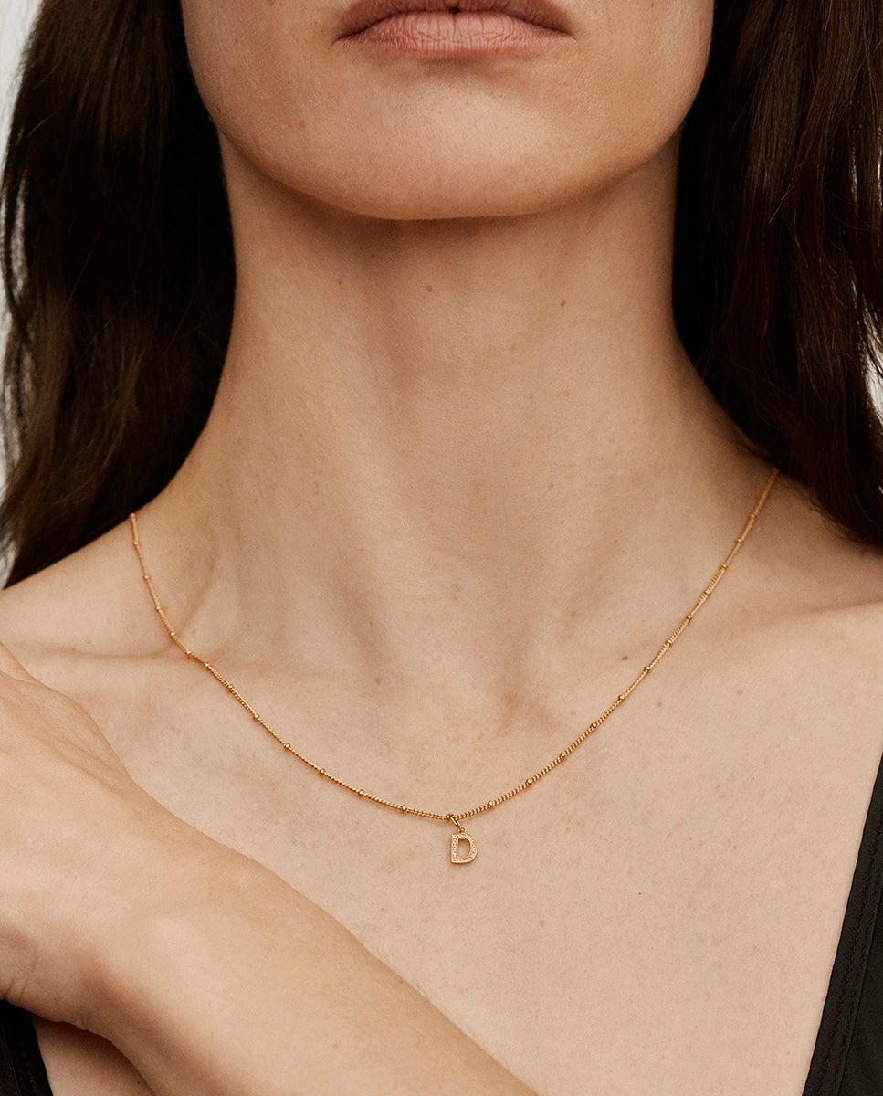 Charm de Prata 925 Banhada em Ouro Amarelo de 18k e Topázios Brancos Inicial D Branco-2