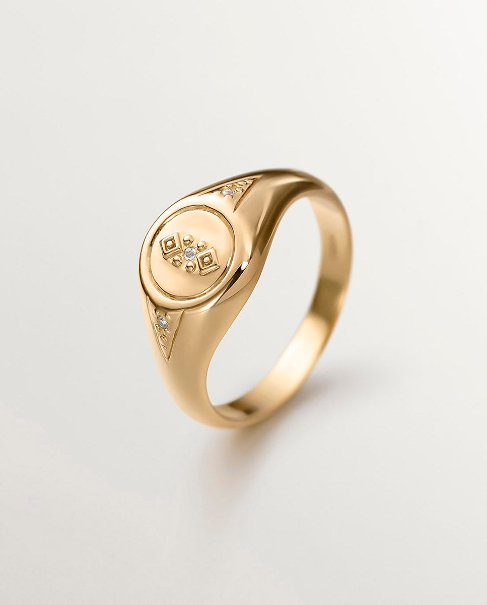 Imagem 0 de Anel Tipo Selo de Prata 925 Banhada em Ouro Amarelo de 18k com Topázio Branco