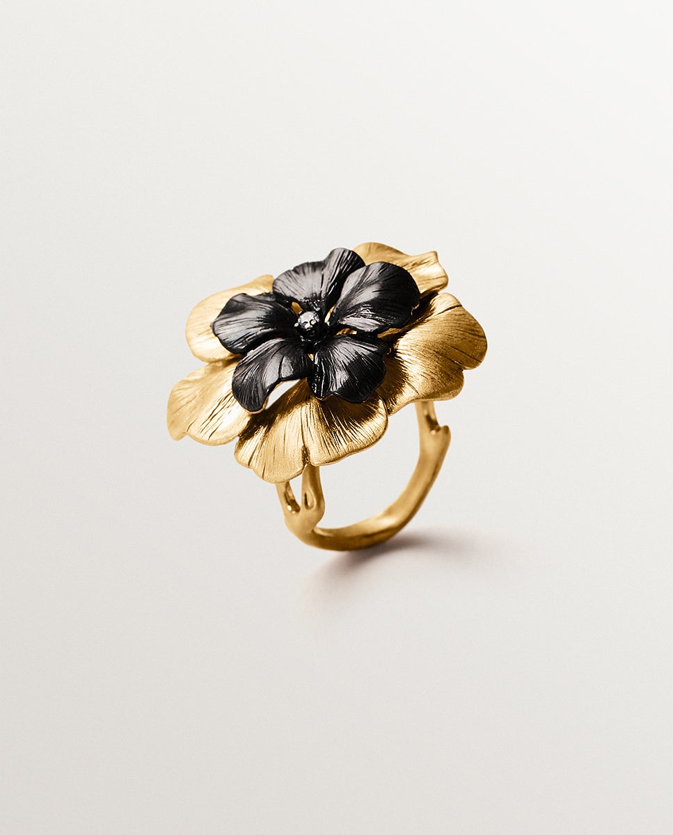 Imagem 0 de Anel Bicolor com Cristal e Forma de Flor