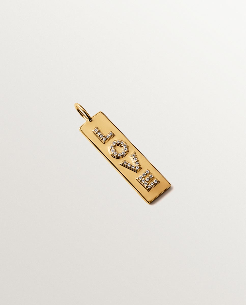 Imagem 0 de Charm de Prata Banhada em Ouro Amarelo de 18k Love com Topázios Brancos