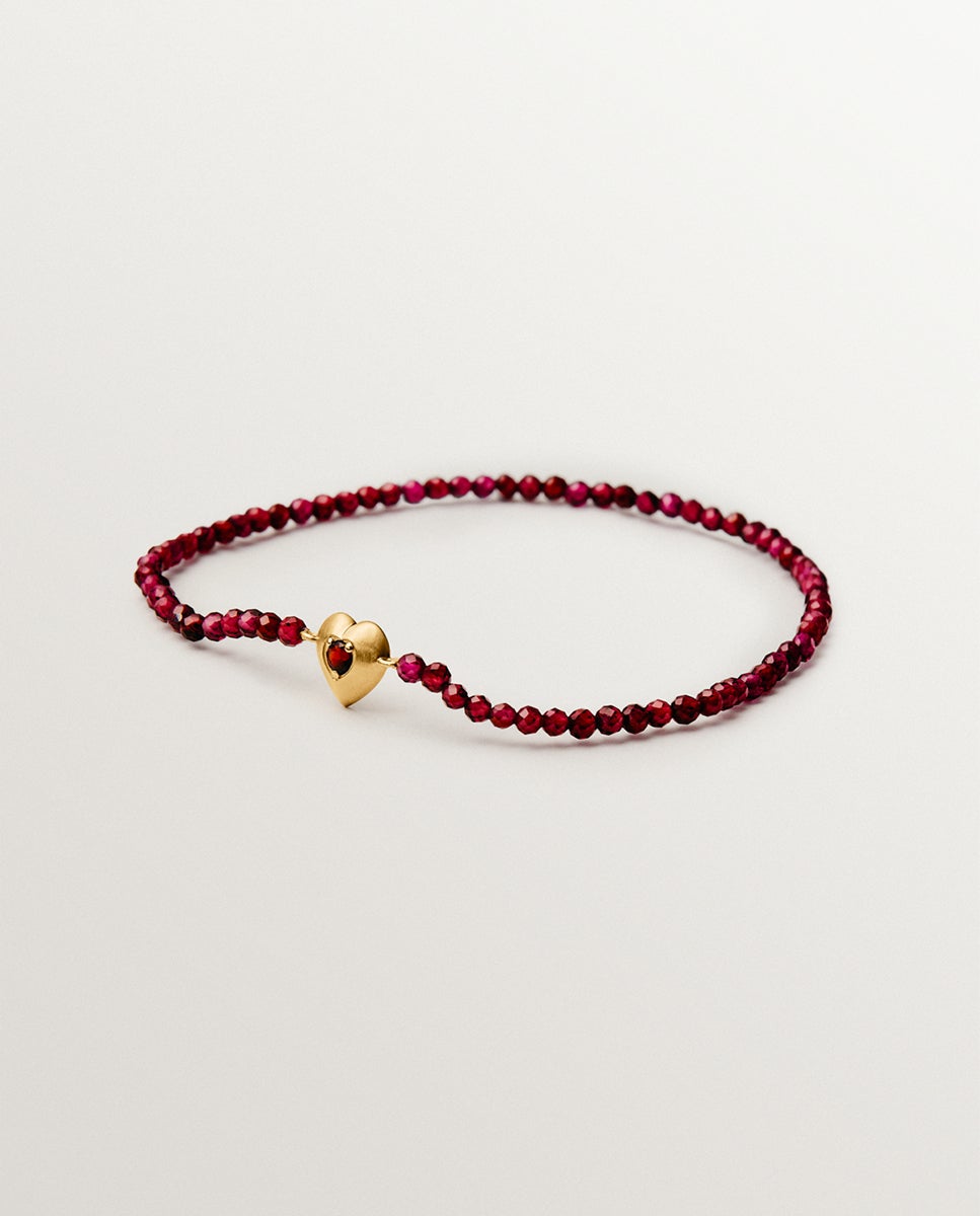 Imagem 0 de Pulseira de Prata Banhada em Ouro Amarelo de 18k com Contas de Granadas e Forma de Coração