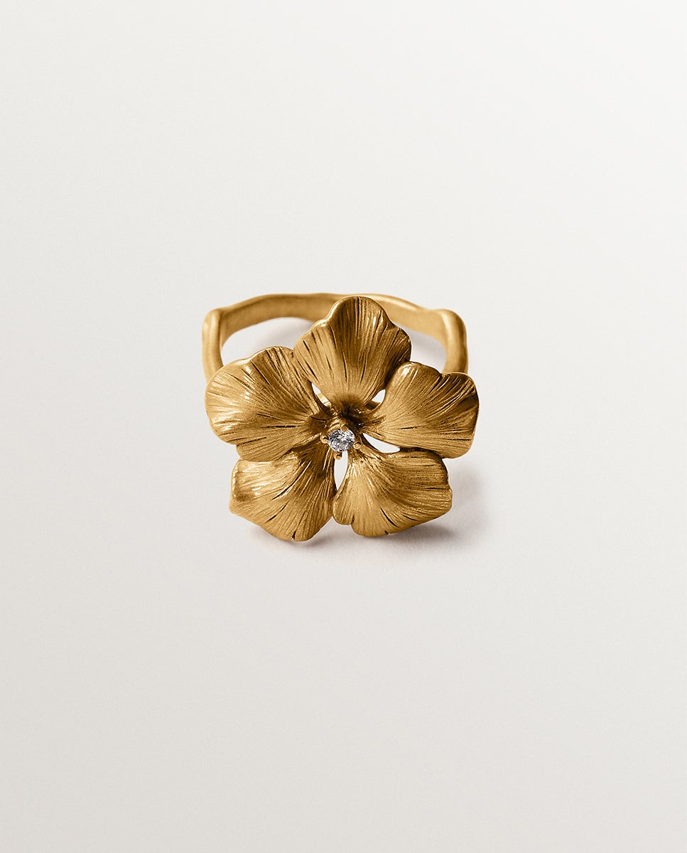 Anel Banhado a Ouro Amarelo com Cristal e Forma de Flor Branco-2