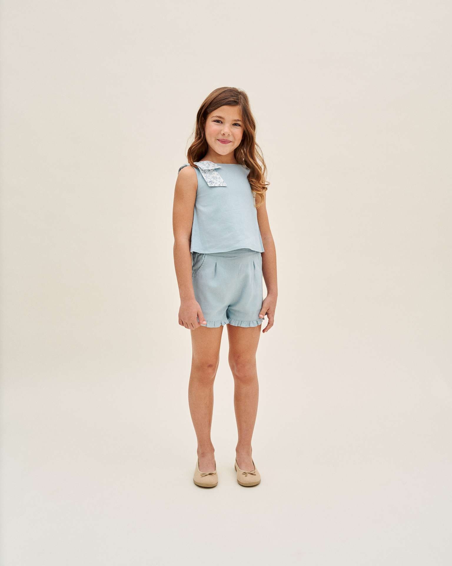 Blusa Infantil com Laço de Flores e Abertura Posterior Azul-1