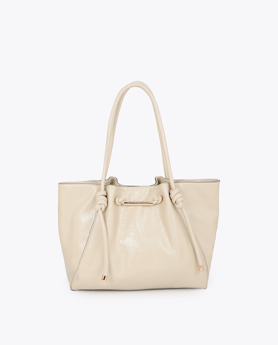 Imagem 0 de Shopper com Detalhe Tubo Metálico com Logo Perfurado