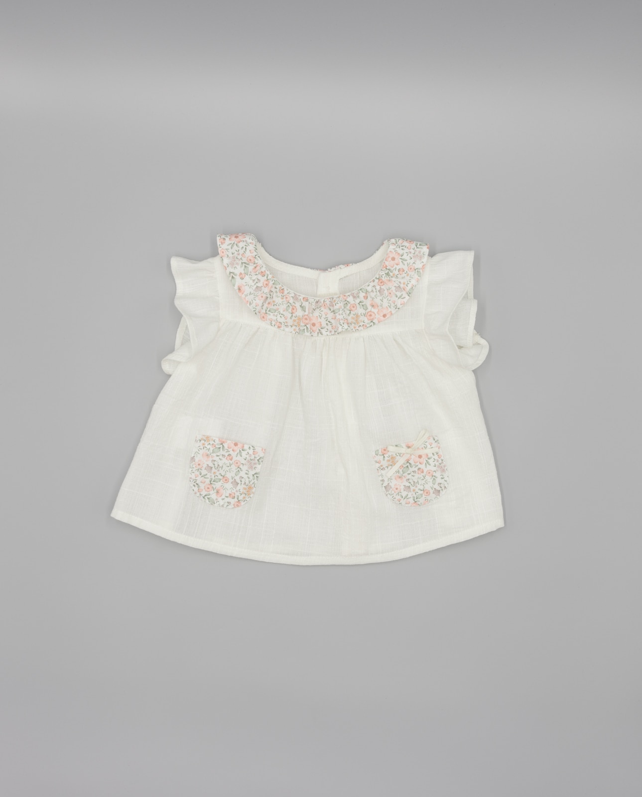 Imagem 0 de Blusa para Bebé Plumeti com Bolsos e Estampado Floral em Contraste