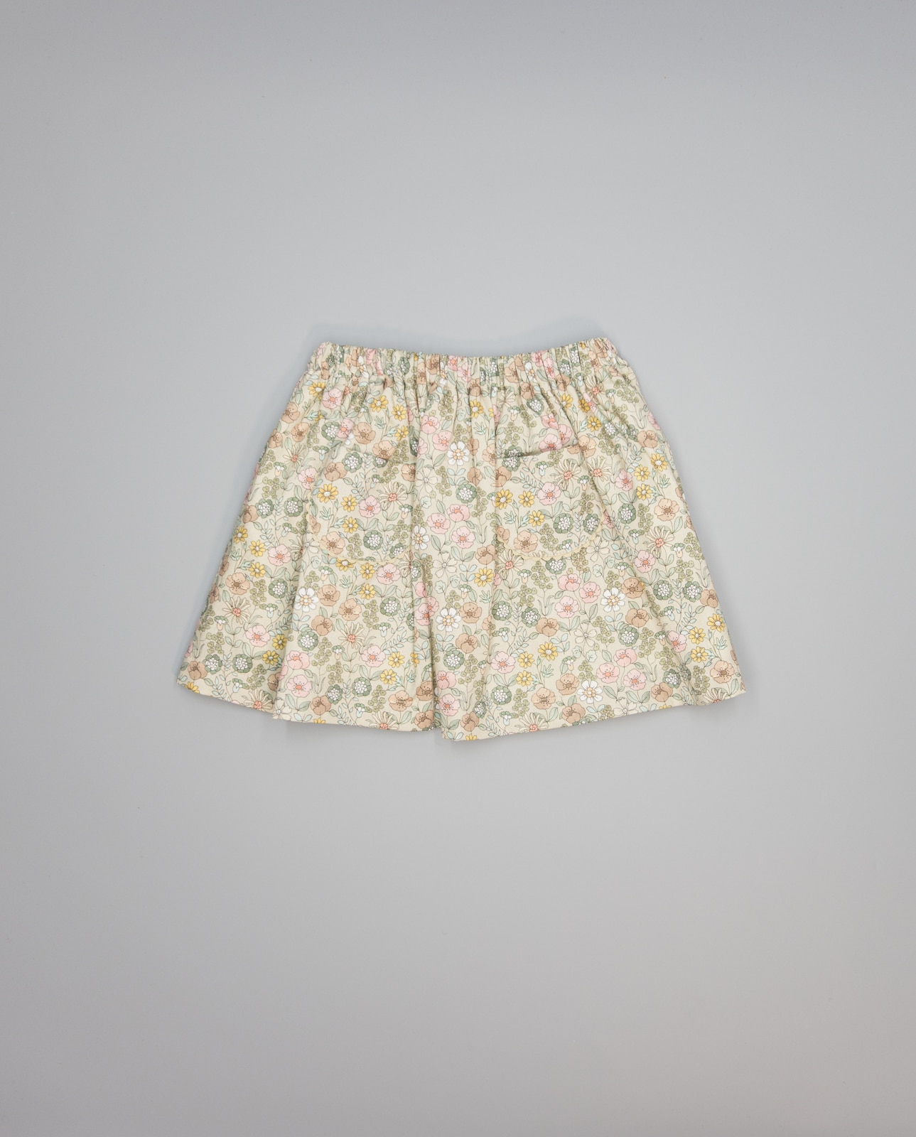 Imagem 0 de Saia Franzida Bege de Viella Floral com Bolsos Rebordados em Bege