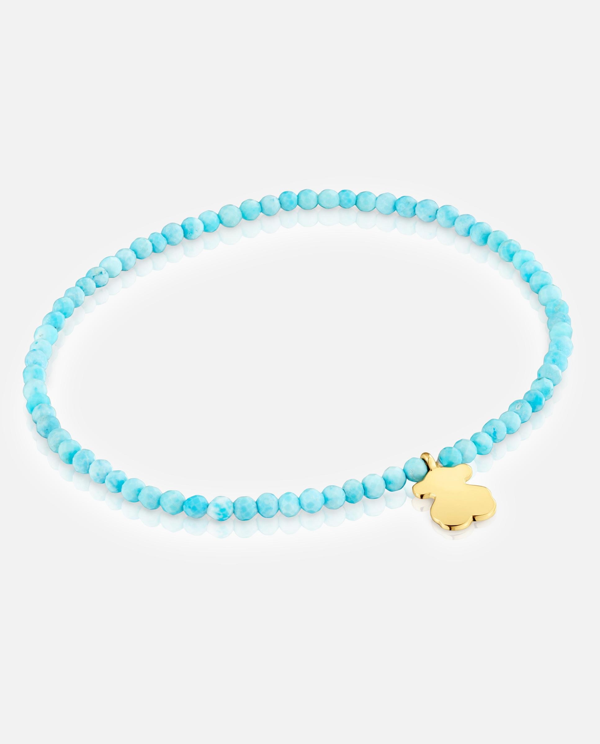 Imagem 0 de Pulseira com Charms Motivos Elástica com Magnésia em Azul e Urso Banhado em Ouro 18 Kt Sobre Prata
