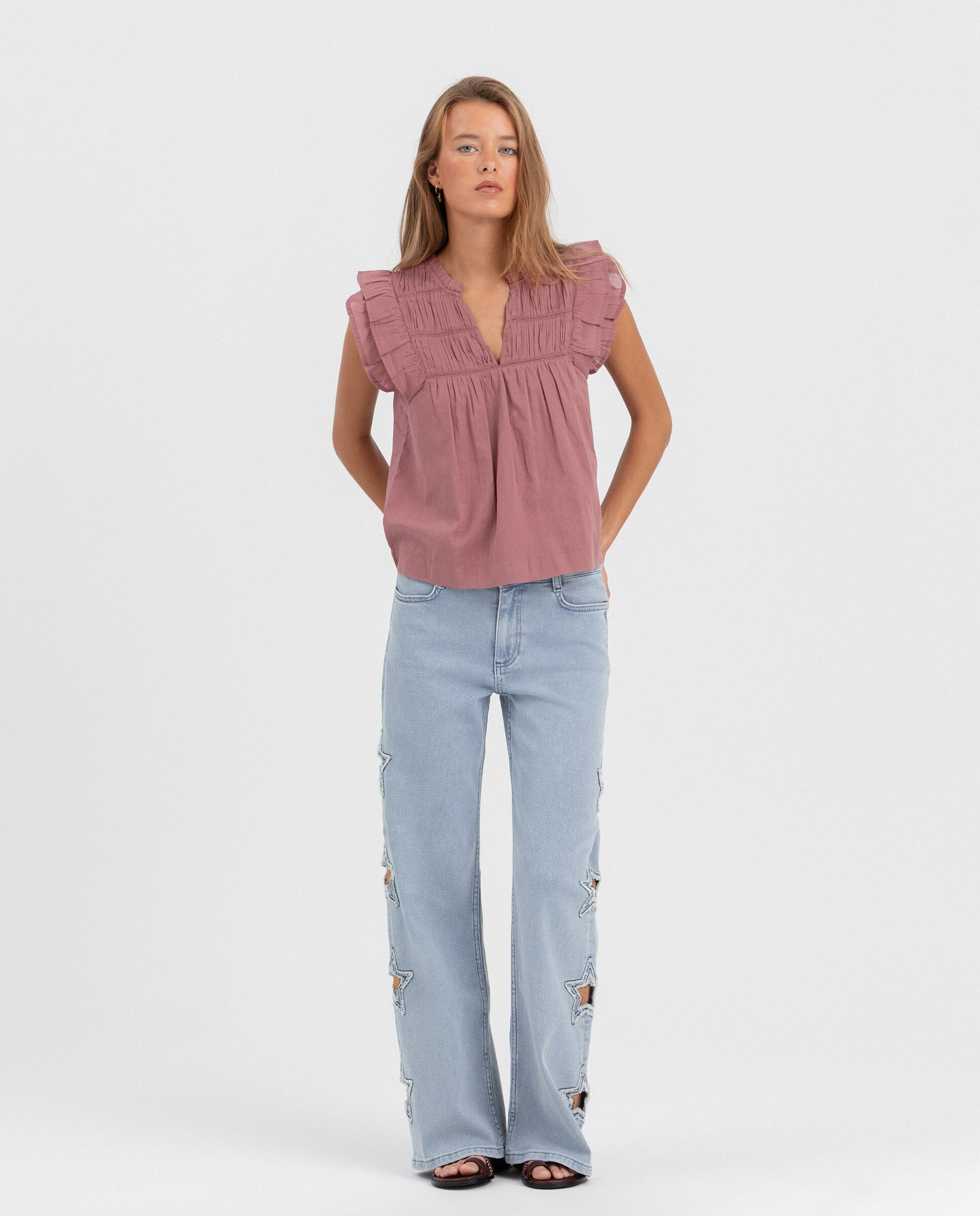 Imagem 0 de Jeans com Estrelas Lateral