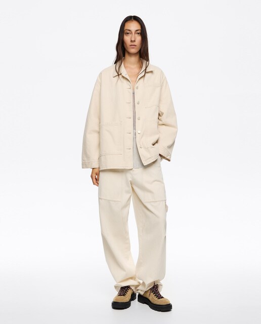 Imagem 0 de Blusão Denim com Corte a Direito