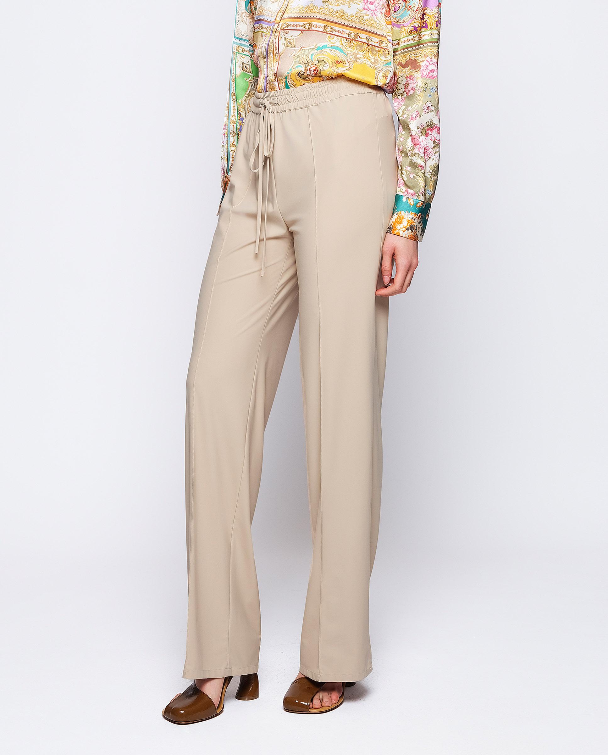 Imagem 0 de Calças Largas Stretch em Tecido Técnico