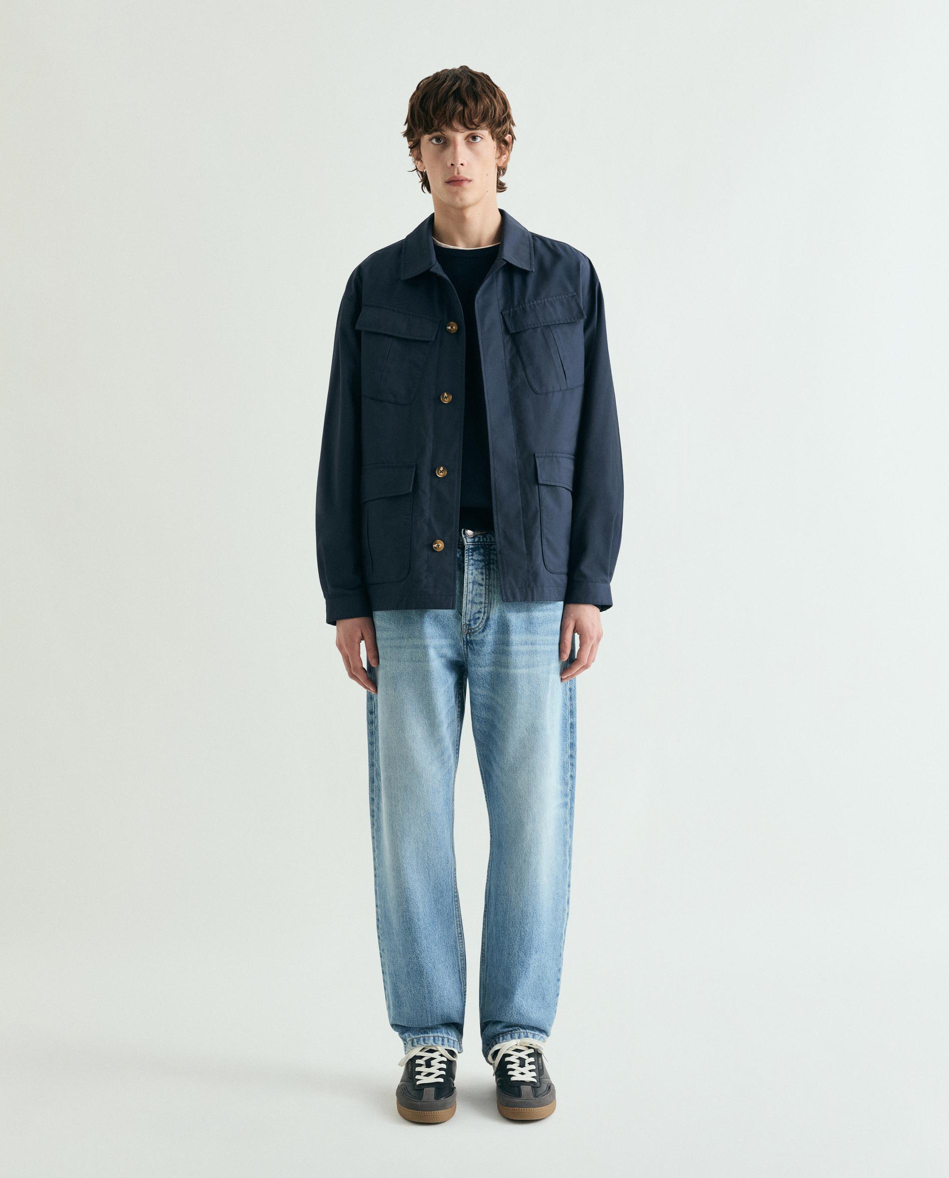 Imagem 0 de Jeans com Corte a Direito Regular Cinco Bolsos