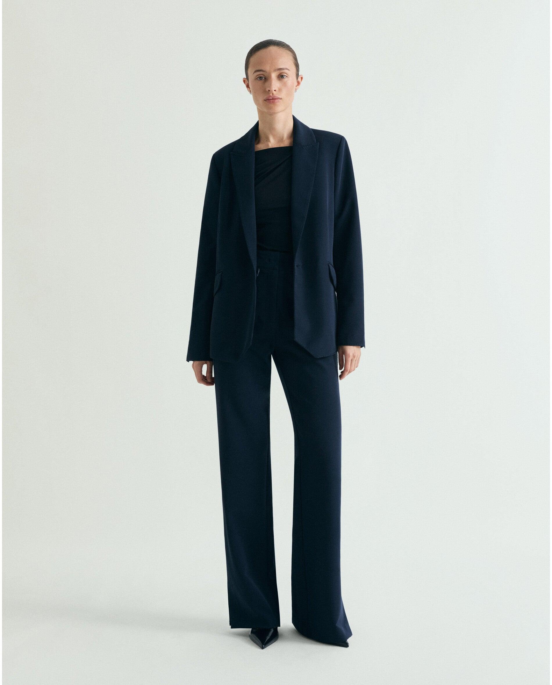 Imagem 0 de Calças com Corte a Direito em Tecido Elástico de Cintura Subida