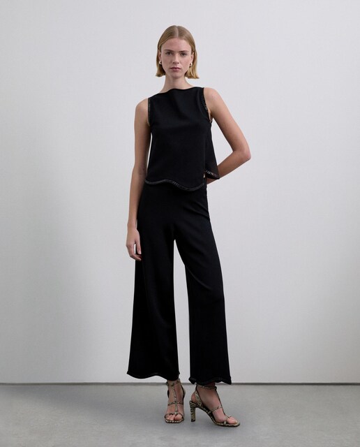 Imagem 0 de Calças Retas com Bainha Ondulada e Acabamento de Lantejoulas