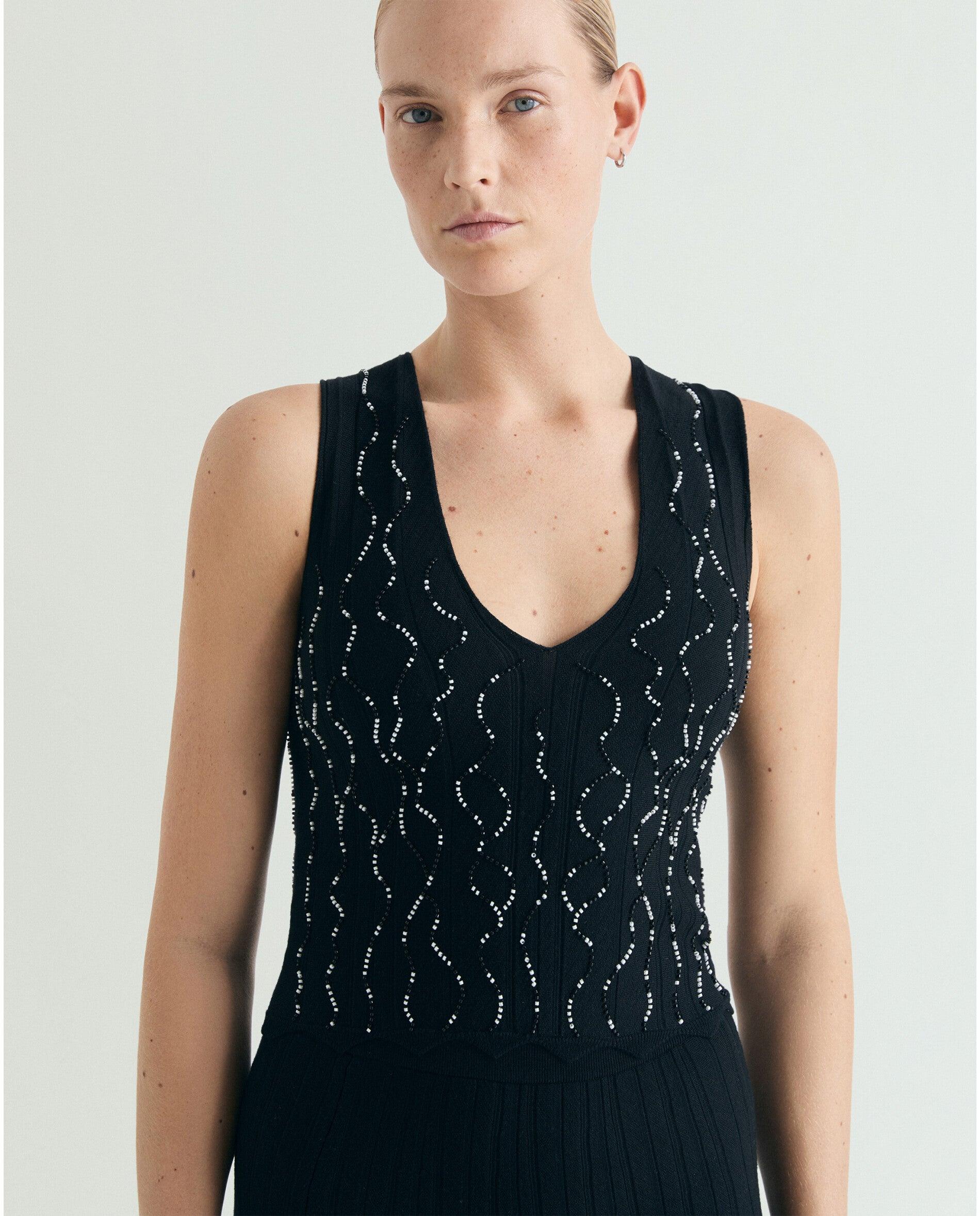 Imagem 0 de Top de Malha sem Mangas com Decote em V