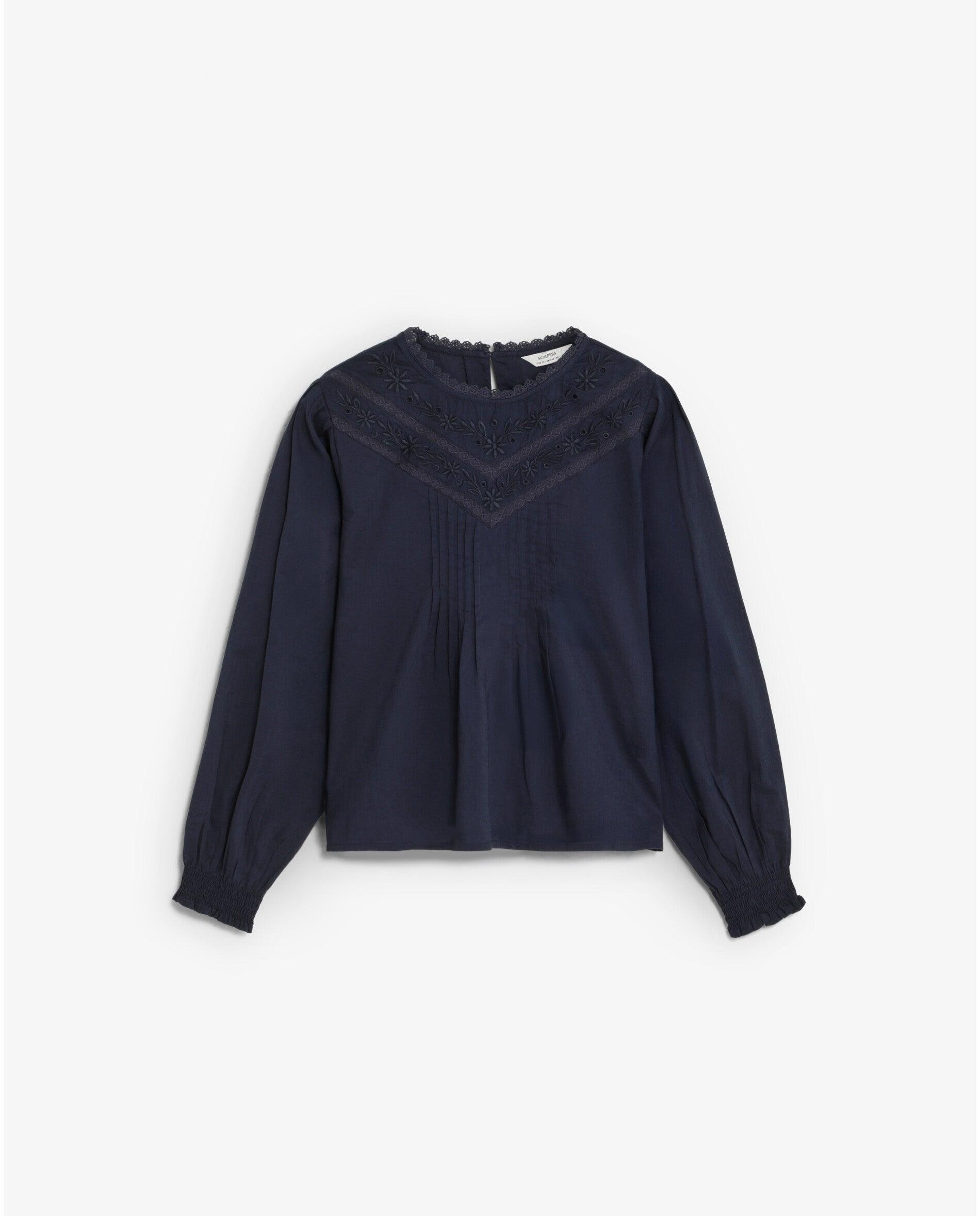 Imagem 0 de Blusa Infantil com Renda e Detalhes Bordados