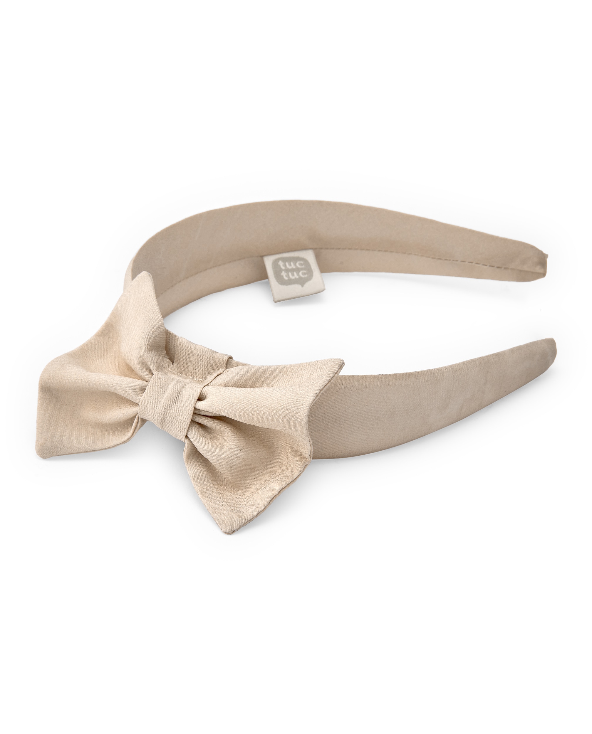 Imagem 0 de Bandolete em Bege com Grande Laço Decorativo