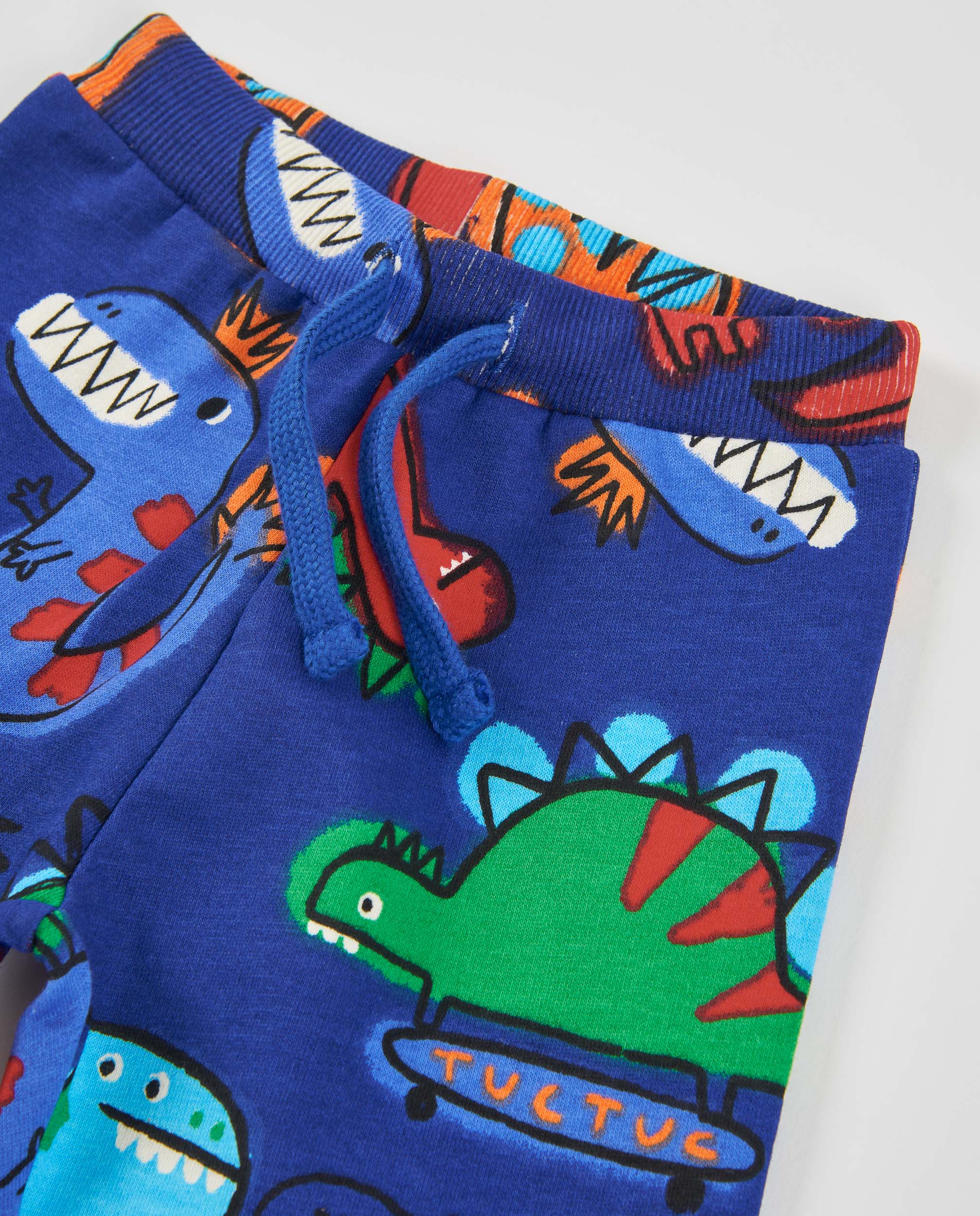 Calças Infantil de Felpa com Print de Dinossauros e Tecido Resistente Azul-4