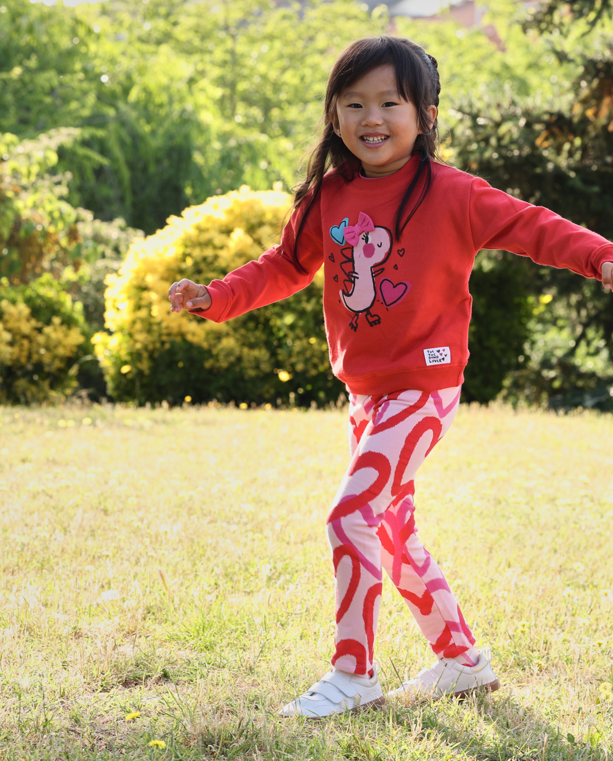 Imagem 0 de Leggings Infantil de Felpa com Estampado de Corações e Ajuste Confortável
