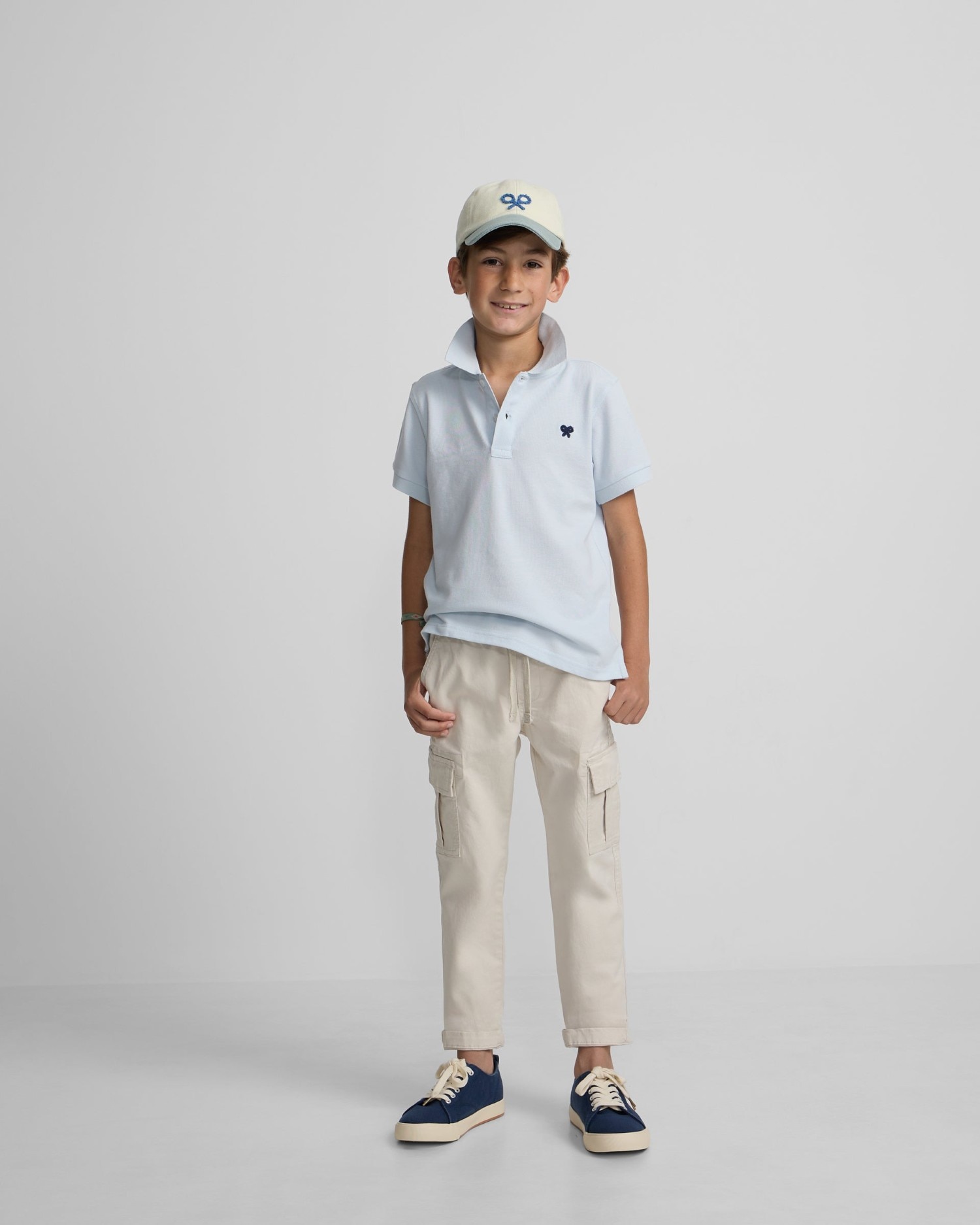 Imagem 0 de Polo Infantil Liso com Logo Rizo