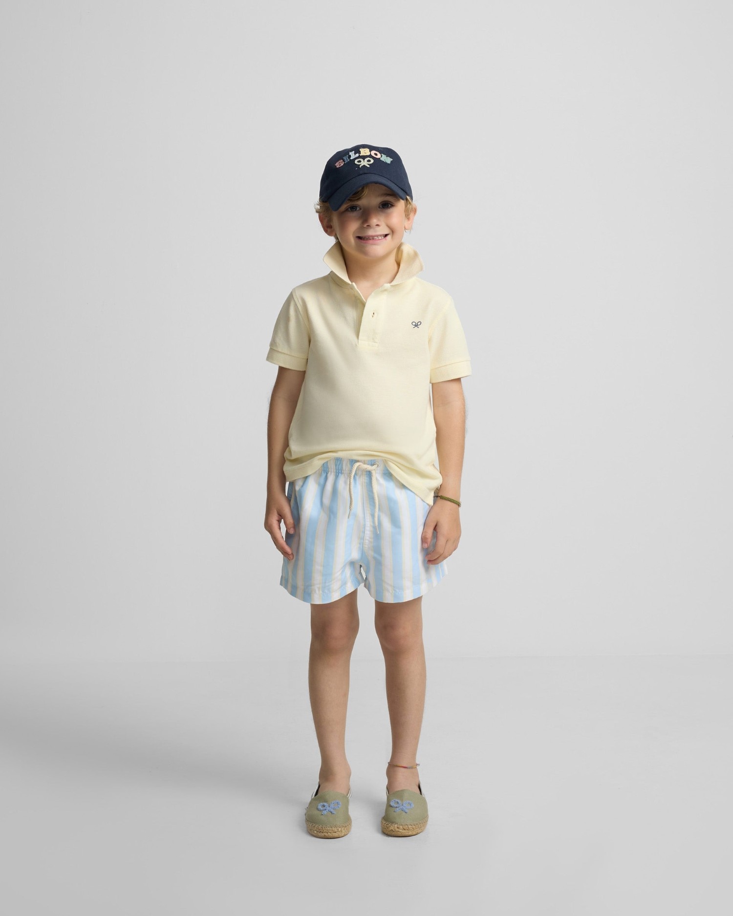 Imagem 0 de Fato de Banho Infantil Às Riscas Largas em Amarelo e Azul