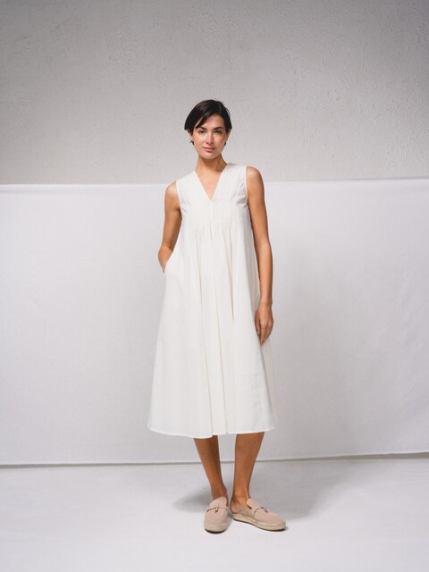 Imagem 0 de Vestido midi e decote em V