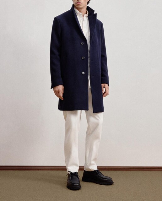 Imagen 0 de Abrigo liso marino modulable de hombre.
