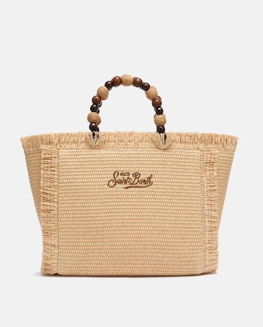 Imagen 0 de Bolso con asas y bandolera liso con topitos