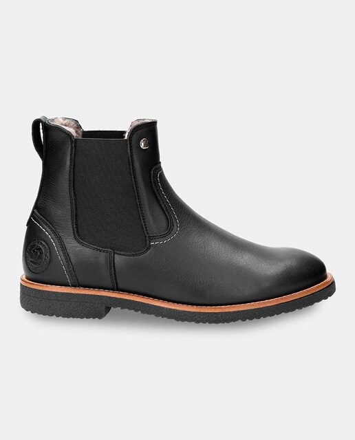 Imagen 0 de Botines de hombre en piel con forro de pelo natural