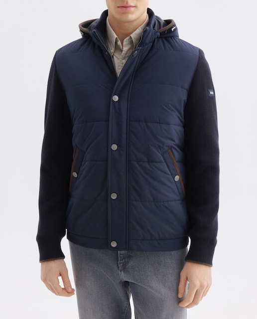 Imagen 0 de Chaquetón corto de hombre con bolsillos inclinados y tejidos híbridos