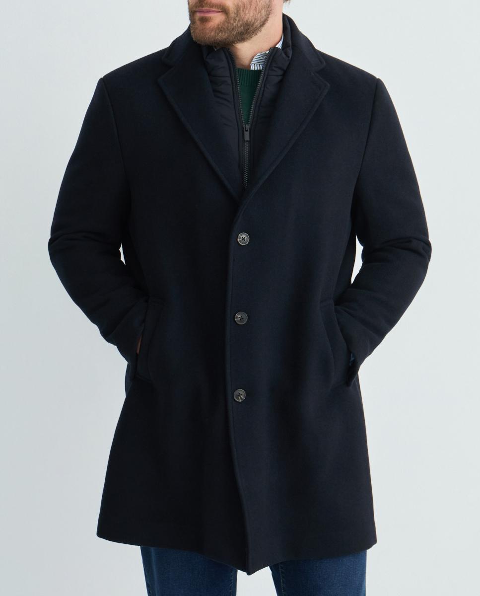 Imagen 0 de Abrigo liso marino modulable de hombre.