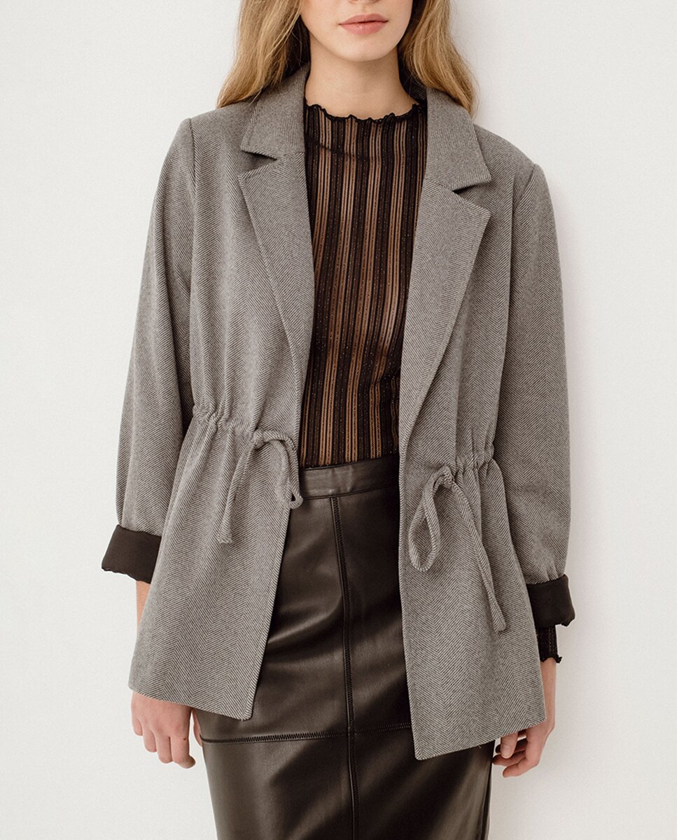 Imagen 0 de Blazer de mujer con solapa y ajustable en la cintura