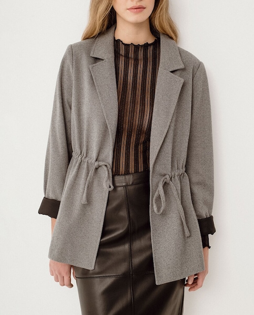 Imagen 0 de Blazer de mujer con solapa y ajustable en la cintura