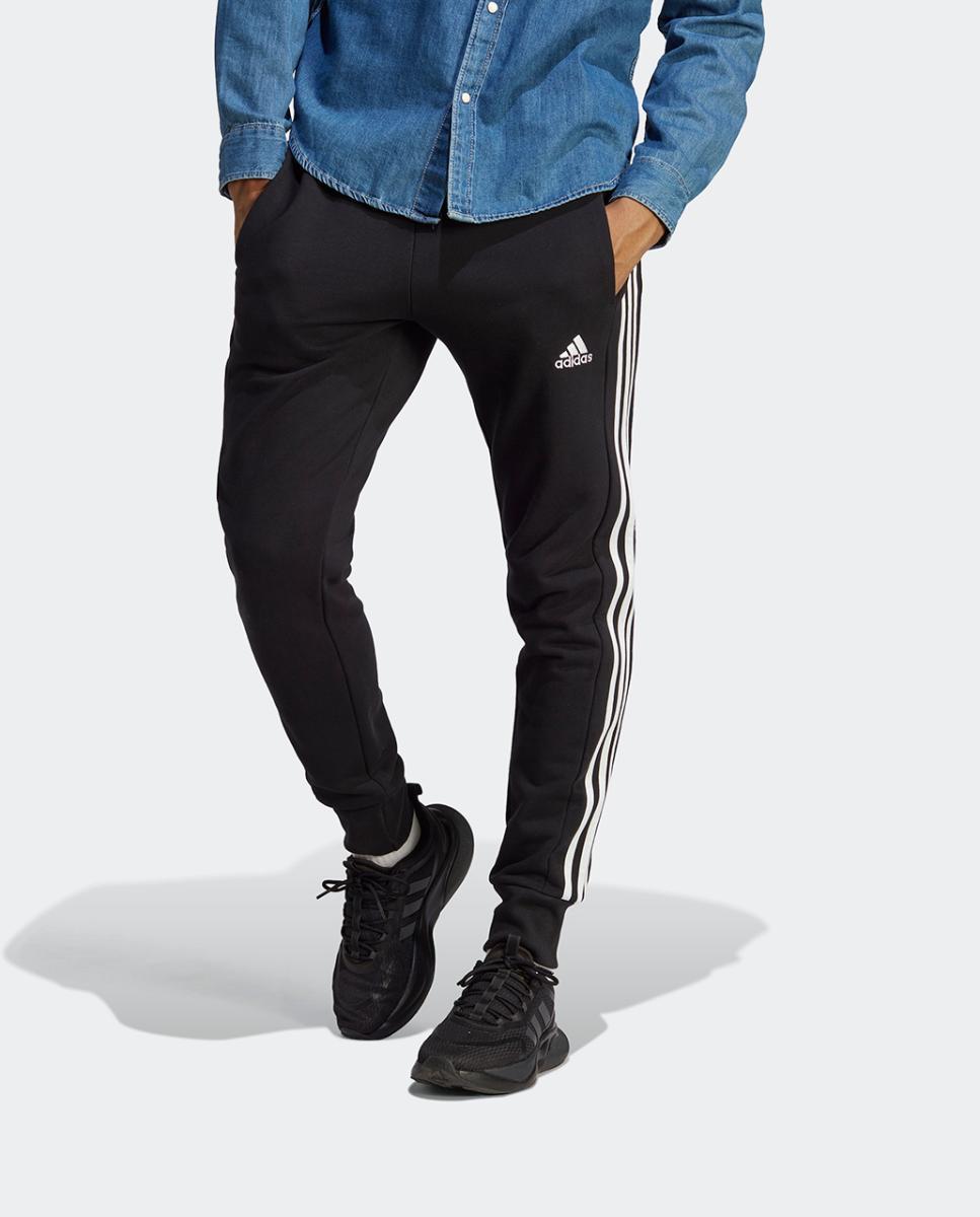 Imagen 0 de Pantalón de hombre Essentials French Terry Tapered Cuff 3 bandas adidas
