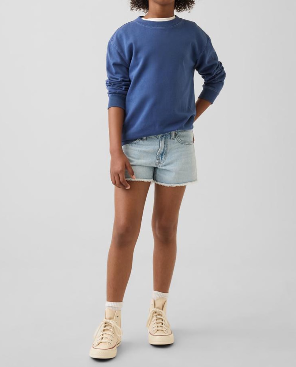 Imagen 0 de Short vaquero tiro bajo de niña