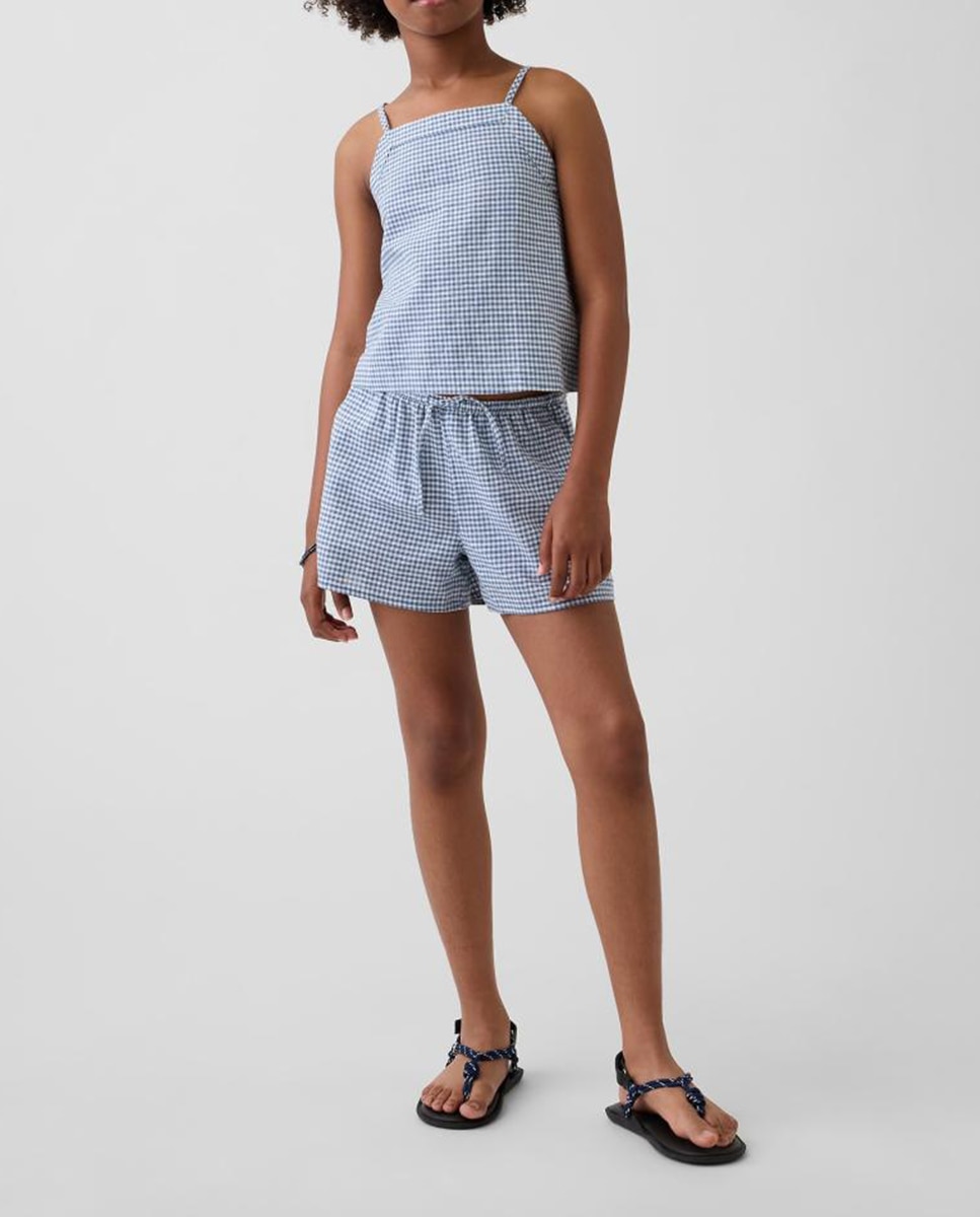 Imagen 0 de Pantalones cortos de niña con cintura elástica y bolsillos laterales.