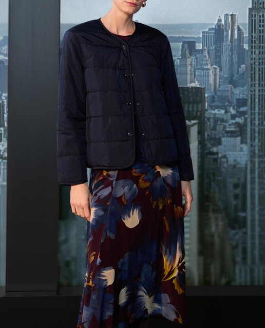 Imagen 0 de Plumífero liso corto de mujer