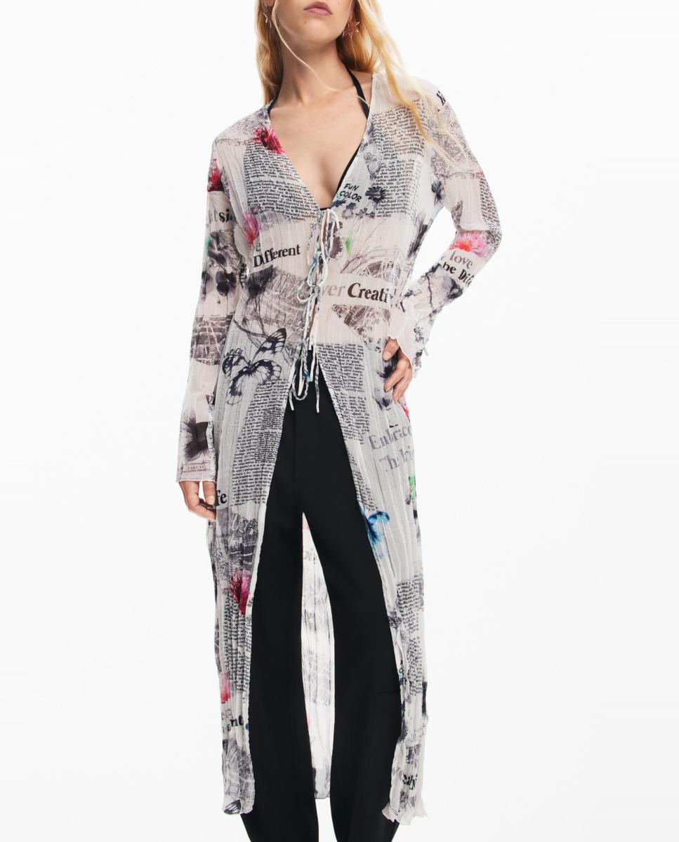 Imagen 0 de Blusa larga estampado periódico de mujer