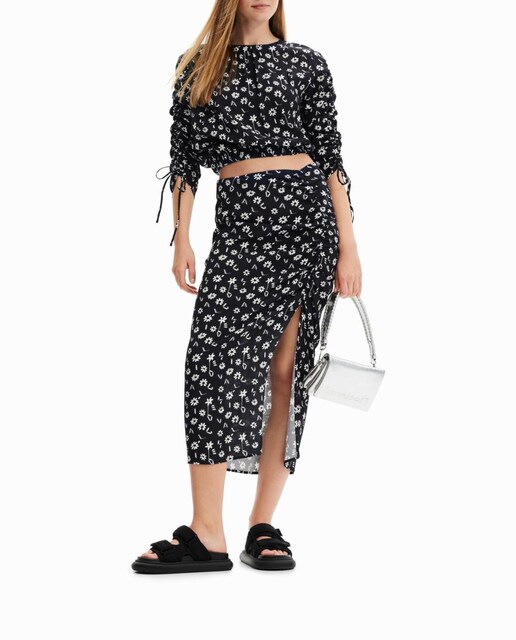 Imagen 0 de Falda midi abertura flores de mujer