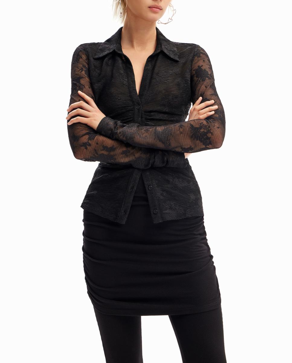 Imagen 0 de Pantalón Flare con falda de mujer