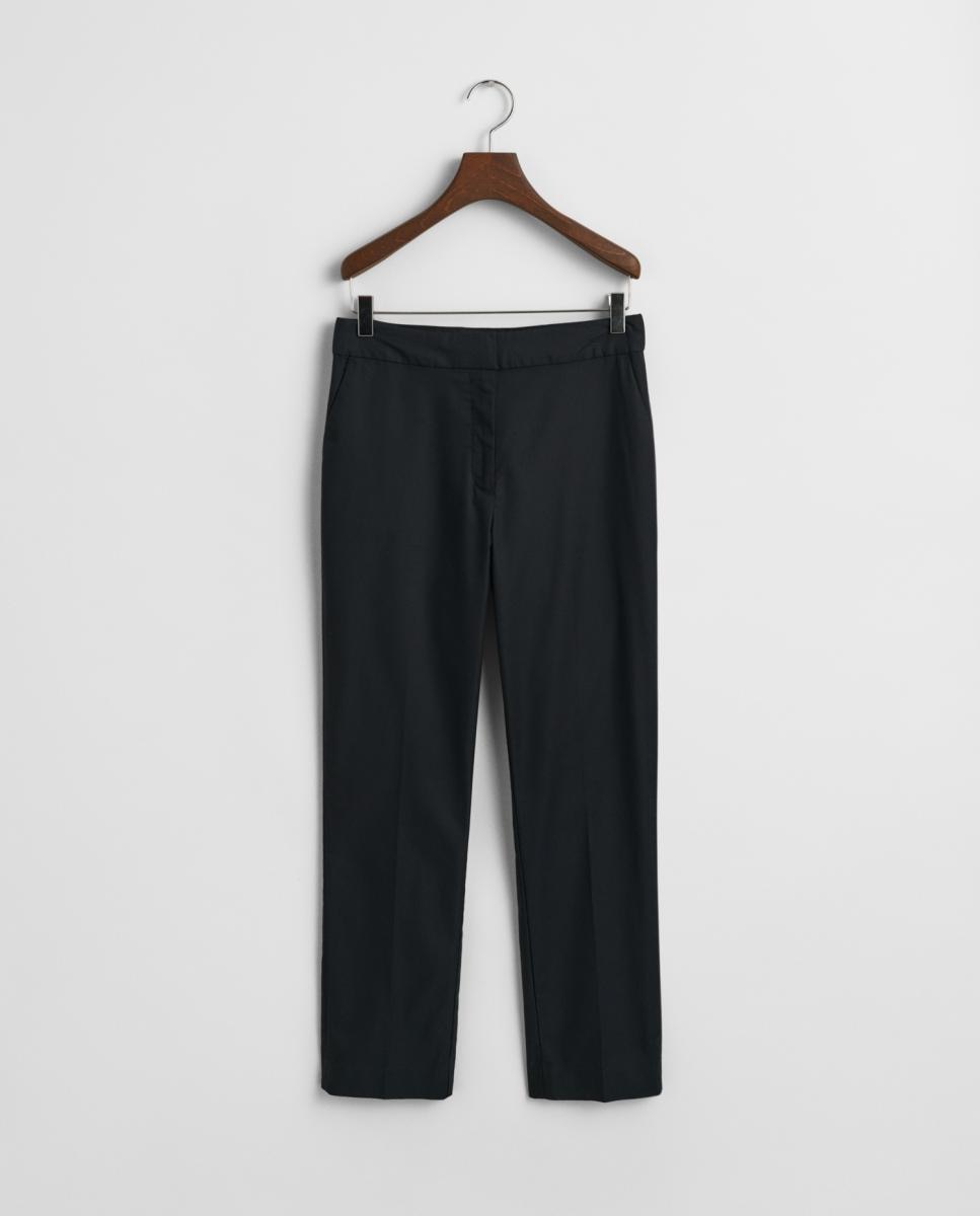 Imagen 0 de Pantalones de mujer en mezcla de algodón con corte slim y largo tobillero.