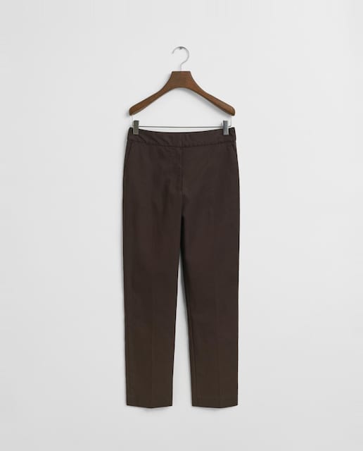 Imagen 0 de Pantalones de mujer en mezcla de algodón con corte slim y largo tobillero.