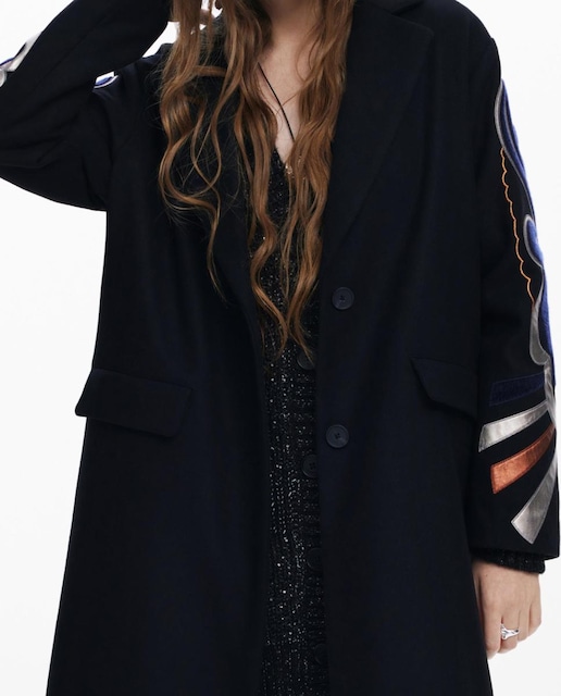 Imagen 0 de Abrigo mangas estampadas de mujer