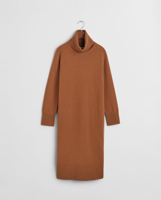 Imagen 0 de Vestido de mujer con apertura inferior y cuello vuelto