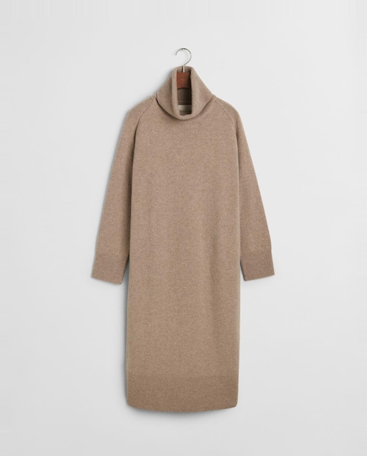 Imagen 0 de Vestido de mujer con apertura inferior y cuello vuelto