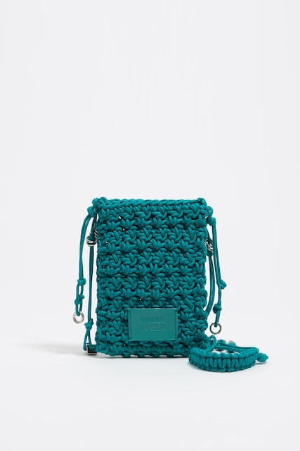 Imagen 0 de Bolso plano mini trenzado turquesa de mujer