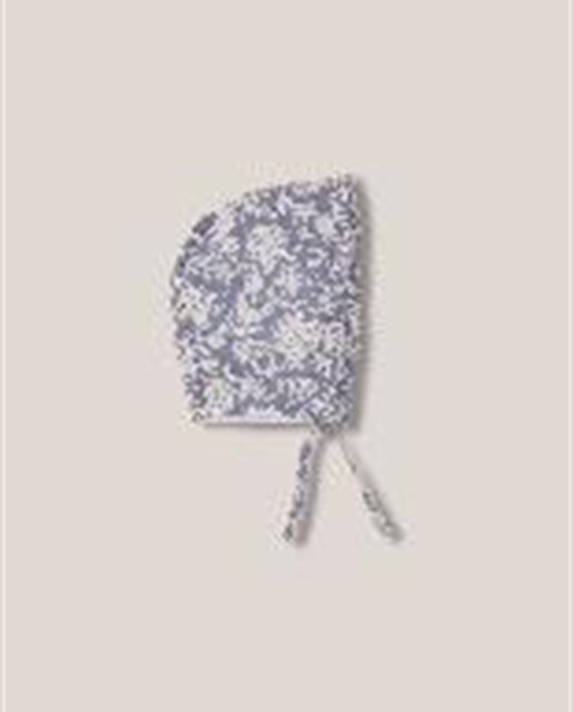 Imagen 0 de Capota de bebé estampada con volante en contorno de cara