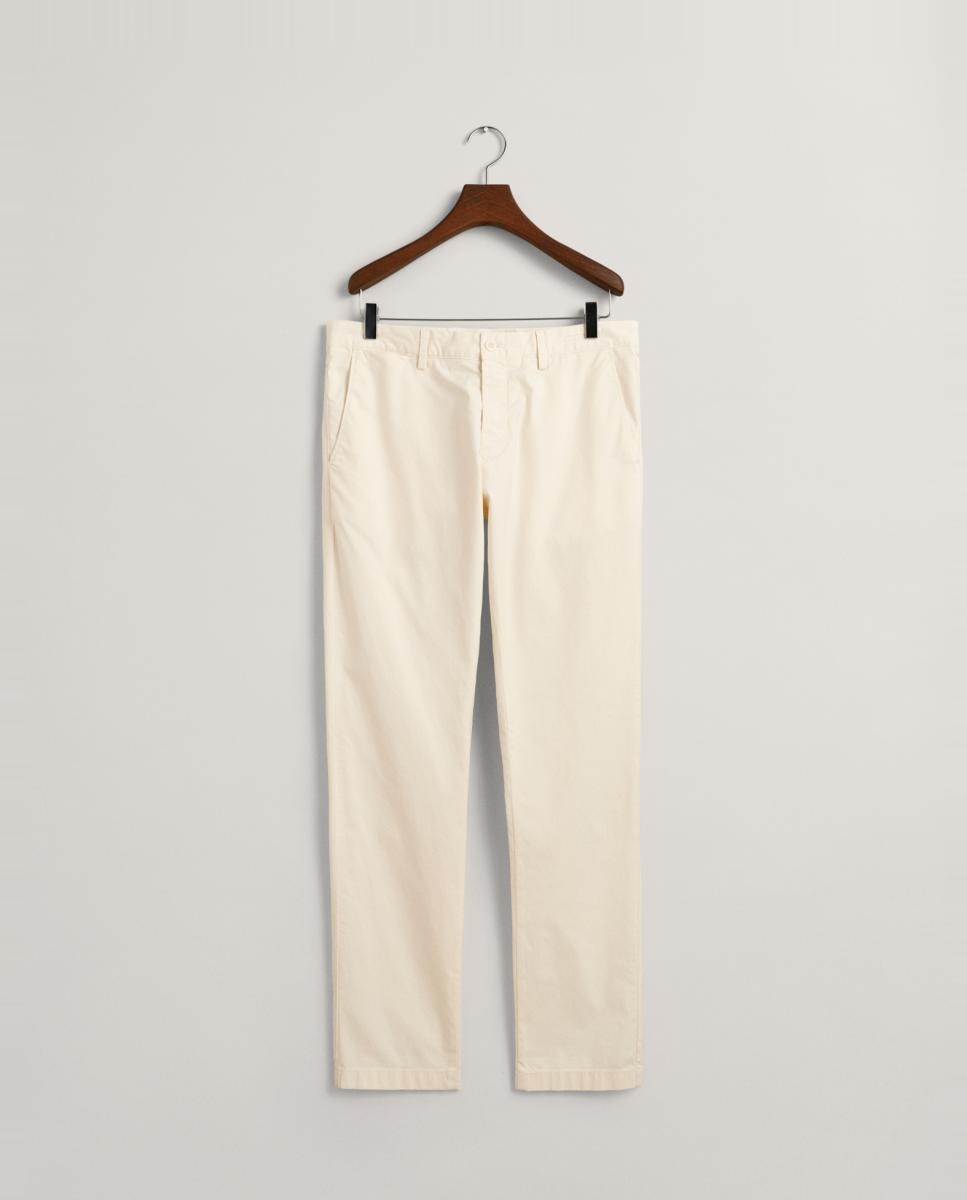 Imagen 0 de Pantalones chinos de hombre en algodón elástico con corte slim y efecto desteñido.