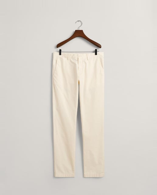 Imagen 0 de Pantalones chinos de hombre en algodón elástico con corte slim y efecto desteñido.