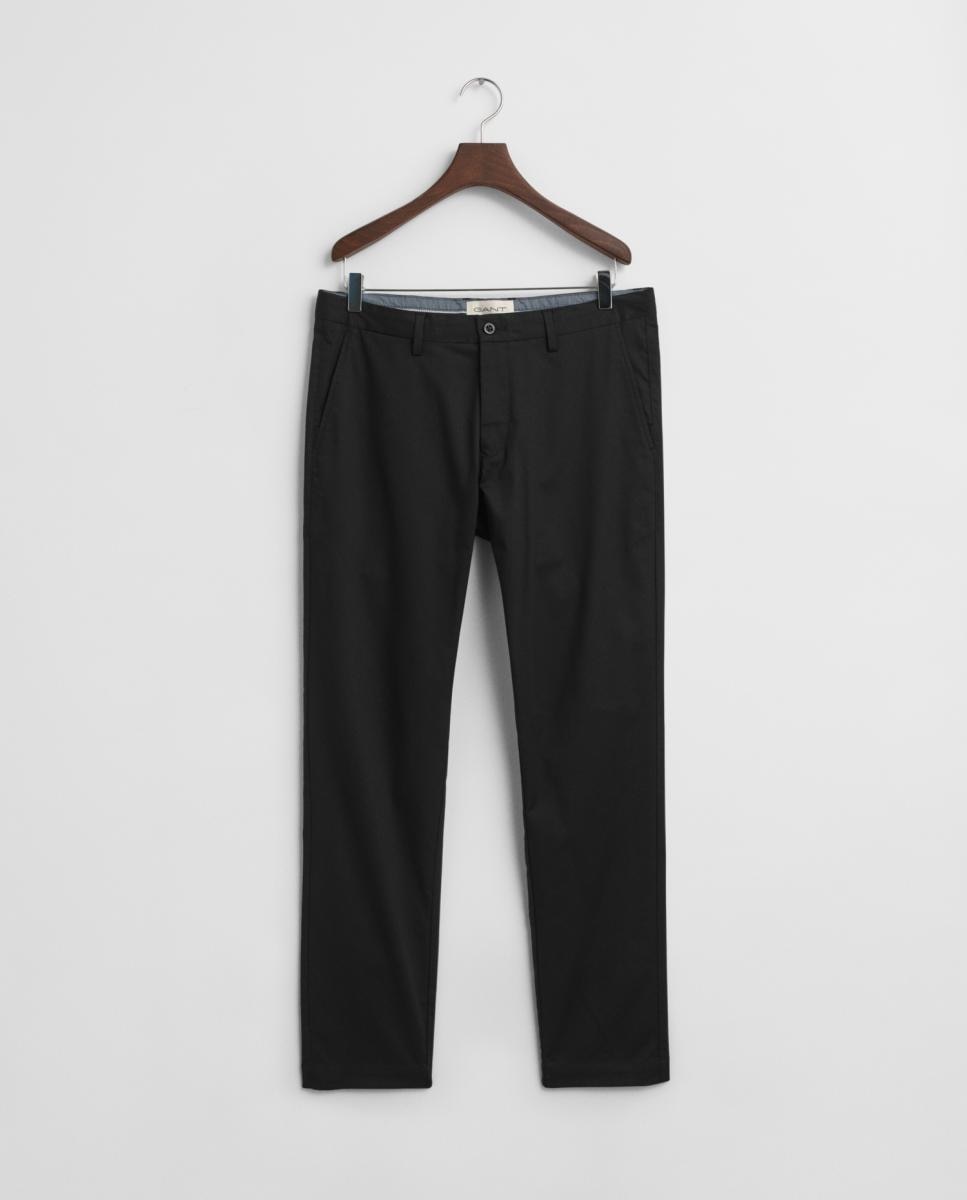 Imagen 0 de Pantalones deportivos chinos de hombre con corte slim y cintura media.