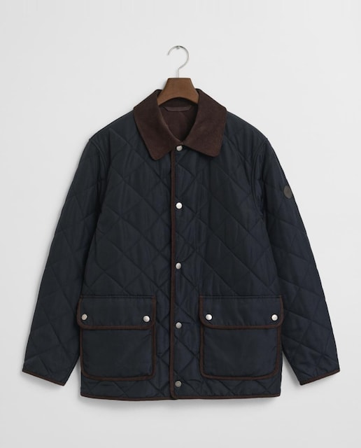 Imagen 0 de Chaqueta acolchada de forro polar de hombre, cálida y versátil, con cierre de botones, cuello contraste y bolsillos inferiores.